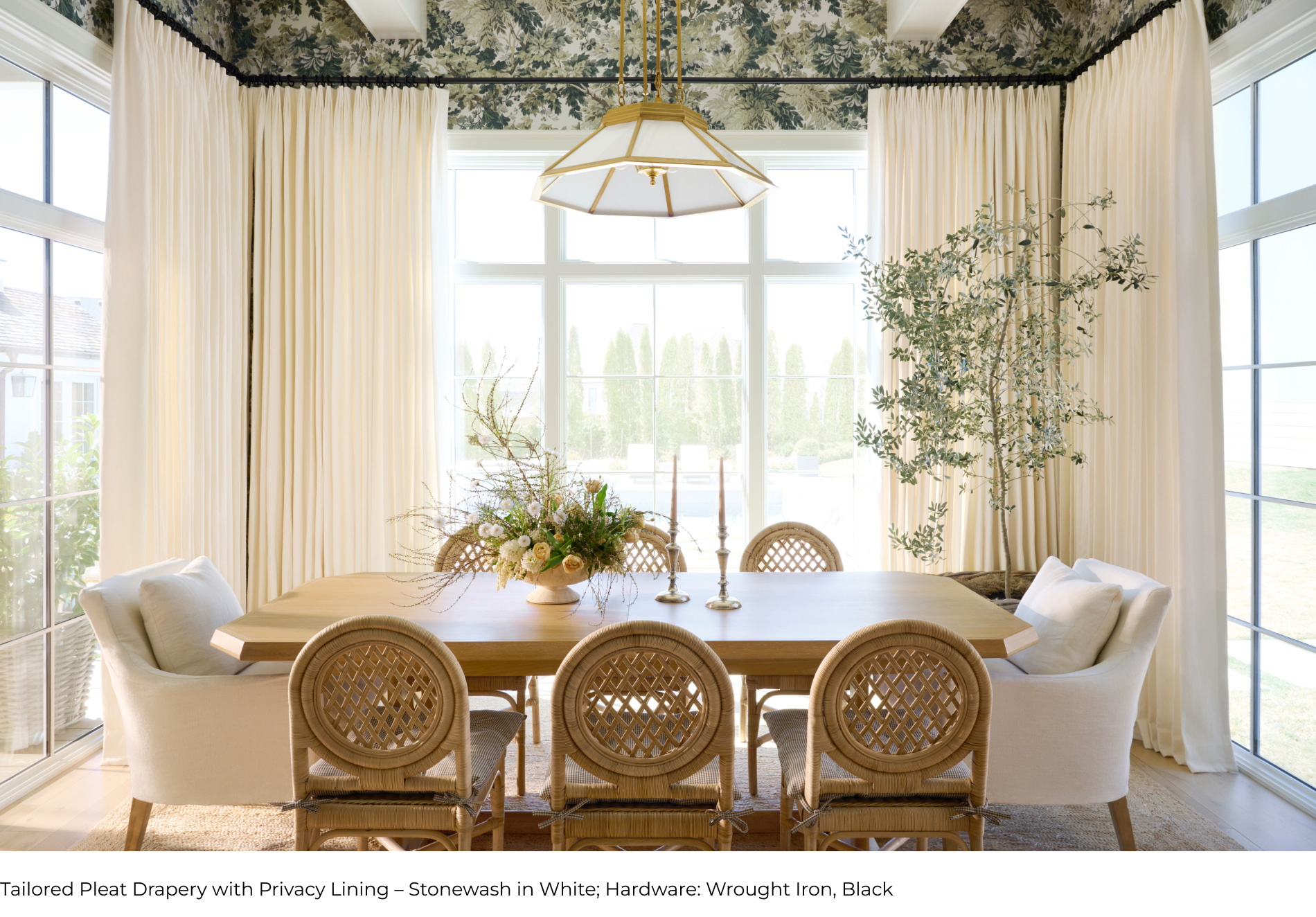 A view of Shea McGee's dining room with drapery from her collection in Stonewash in White.