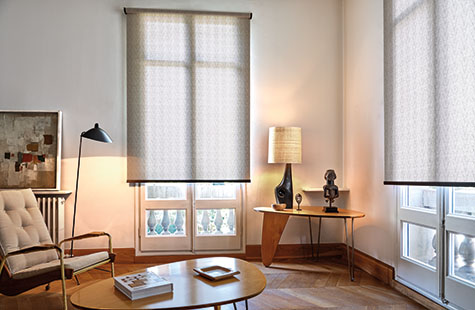 Roller Shades for windows made of Tea Leaves in Brown cover French doors in a mid-century modern lounge