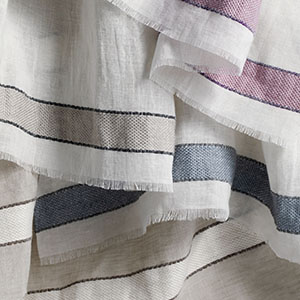 Another popular trend in 2026 for window treatments is the use of Harbor Stripe as evinced by these swatches of different colors