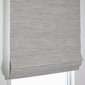 Waterfall Woven Wood Shades feature a flat, crisp fold when the material is raised for a clean look